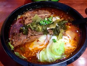 Spicy Beef Noodle Soup with Pickled Greens
